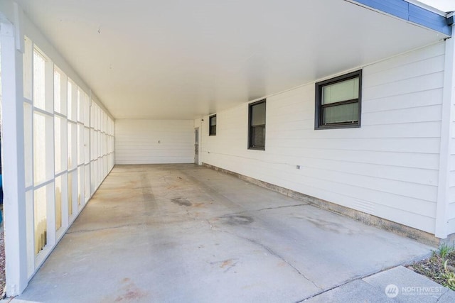 exterior space with an attached carport