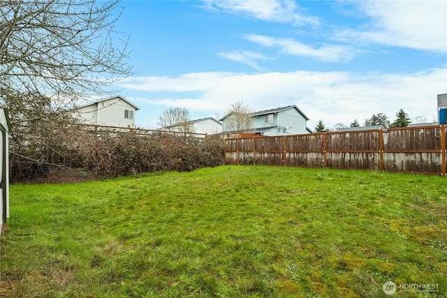 view of yard with fence