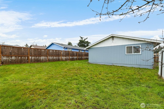 view of yard with fence