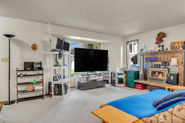 living area featuring a wealth of natural light, a textured ceiling, and carpet floors