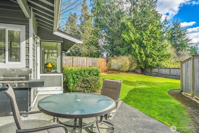 view of patio / terrace with outdoor dining area and a fenced backyard