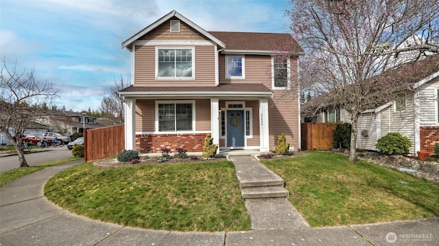 23806 SE 282nd St, Maple Valley, WA 98038 - view of front of house with a front yard, fence, and brick siding