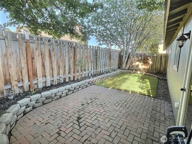 view of patio with a fenced backyard