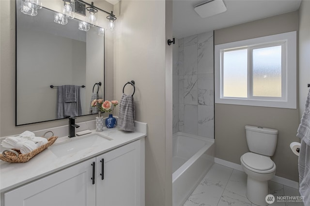 bathroom featuring baseboards, toilet, shower / tub combination, marble finish floor, and vanity