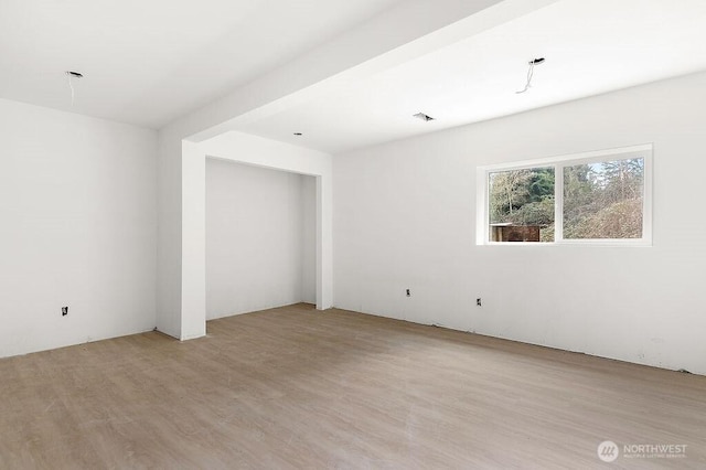 spare room with visible vents and light wood finished floors