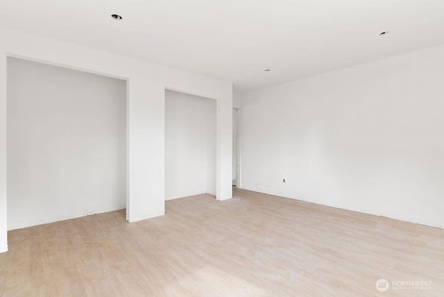 empty room featuring light wood-type flooring