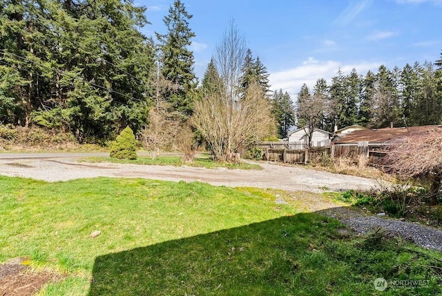 view of yard with fence