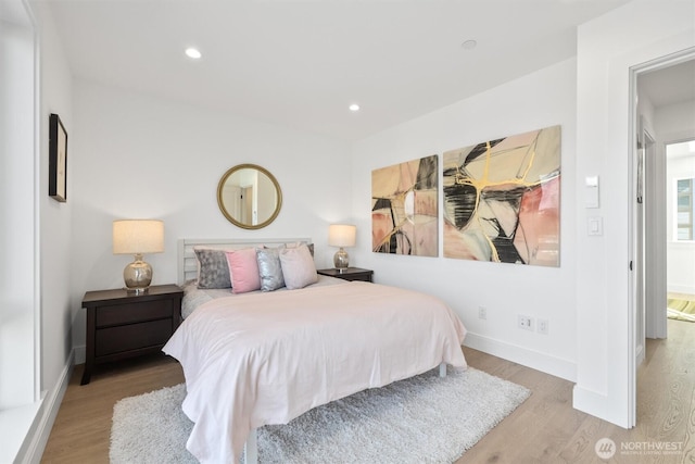 bedroom featuring recessed lighting, baseboards, and wood finished floors