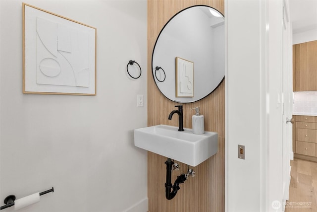 bathroom featuring wood finished floors