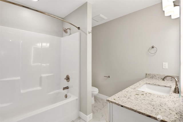 full bath featuring vanity, baseboards, shower / bath combination, toilet, and marble finish floor