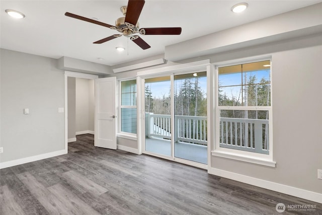 unfurnished room featuring recessed lighting, wood finished floors, baseboards, and ceiling fan