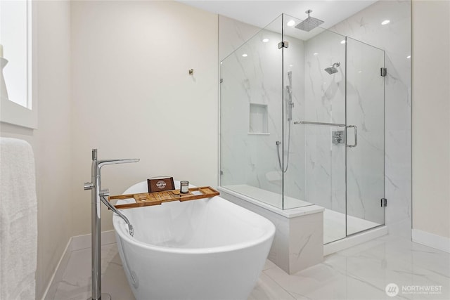 full bathroom featuring a marble finish shower, baseboards, a soaking tub, and marble finish floor