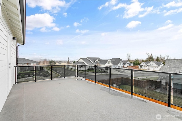 view of patio / terrace featuring a residential view and a balcony