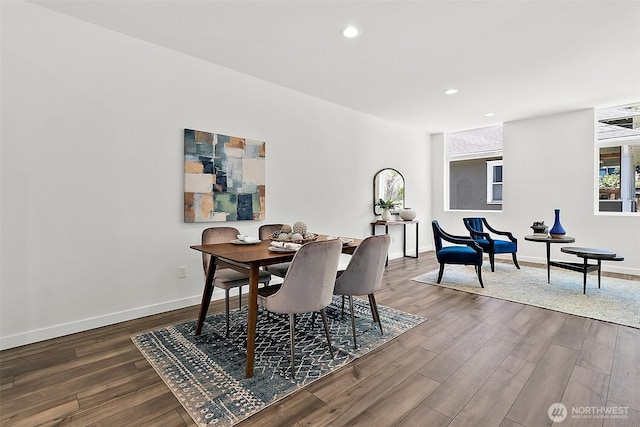 dining space featuring recessed lighting, baseboards, and dark wood-style flooring