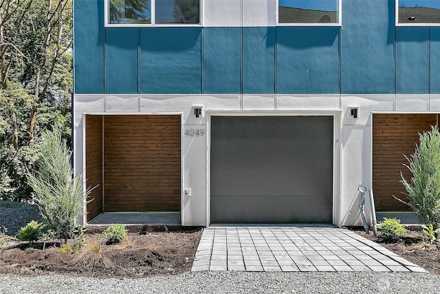 garage featuring driveway