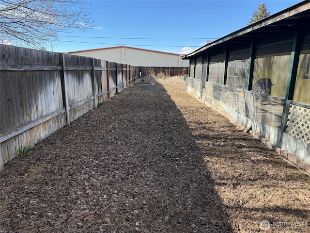 view of yard featuring a fenced backyard