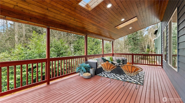 wooden deck featuring an outdoor hangout area