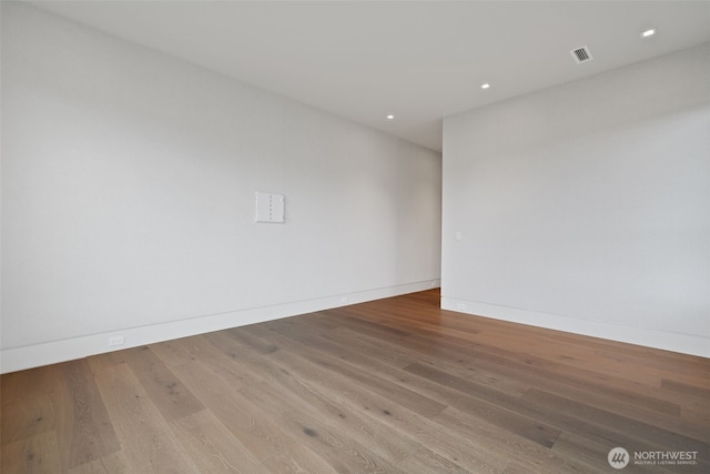 3119 Heron St, Woodland, WA 98674 - unfurnished room with recessed lighting, wood finished floors, visible vents, and baseboards