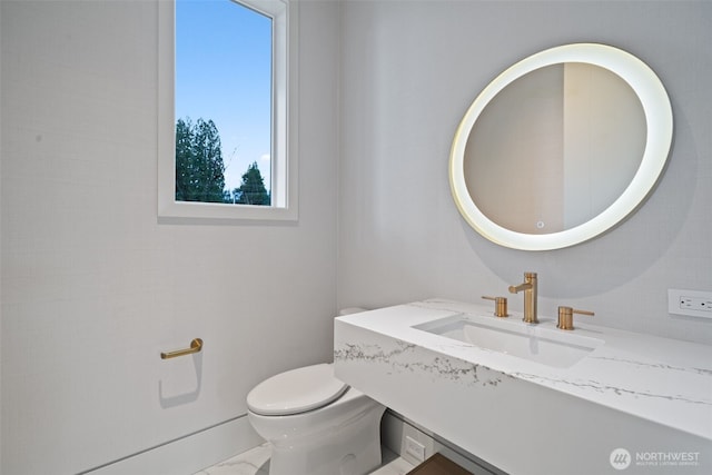 3119 Heron St, Woodland, WA 98674 - bathroom with marble finish floor, toilet, and vanity