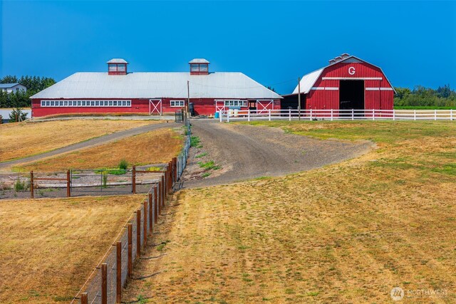 4596 Woodcock Rd, Sequim, WA 98382 - view of horse barn featuring a rural view
