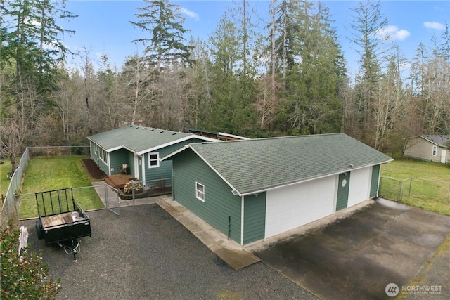 exterior space featuring a wooded view