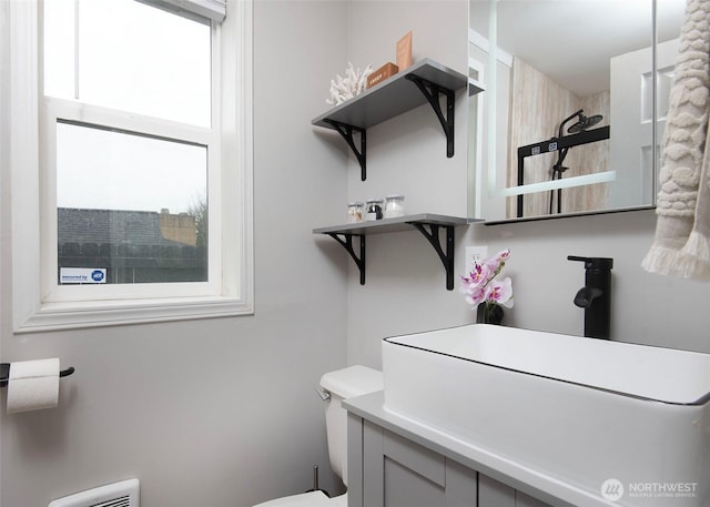 bathroom featuring a sink and toilet