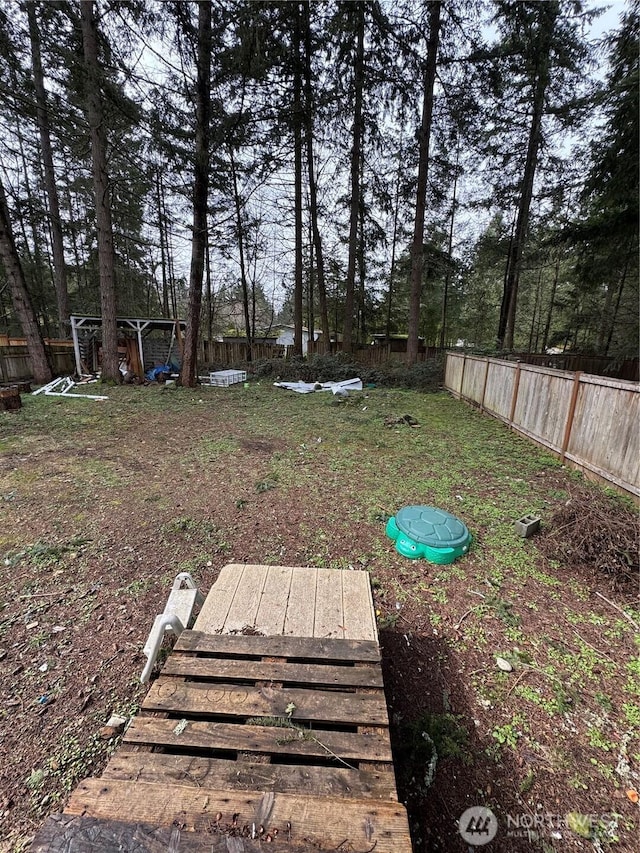 view of yard featuring fence