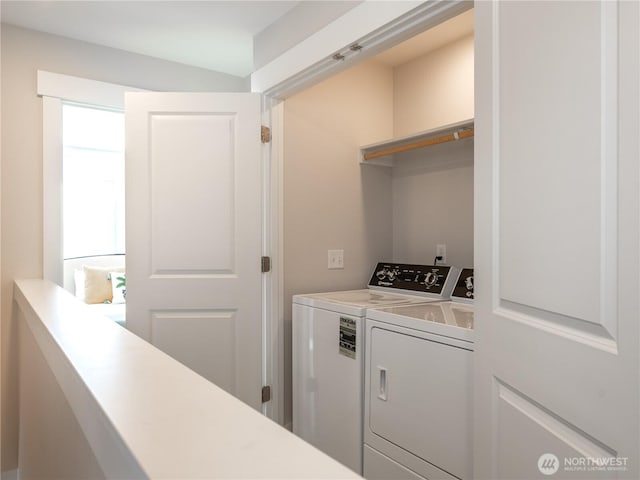 laundry area featuring laundry area and washer and dryer