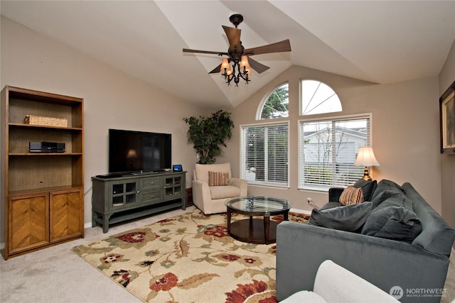 living area featuring light carpet, ceiling fan, baseboards, and lofted ceiling