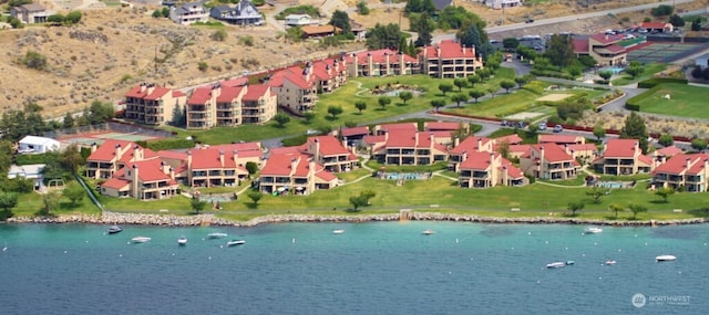 birds eye view of property featuring a water view