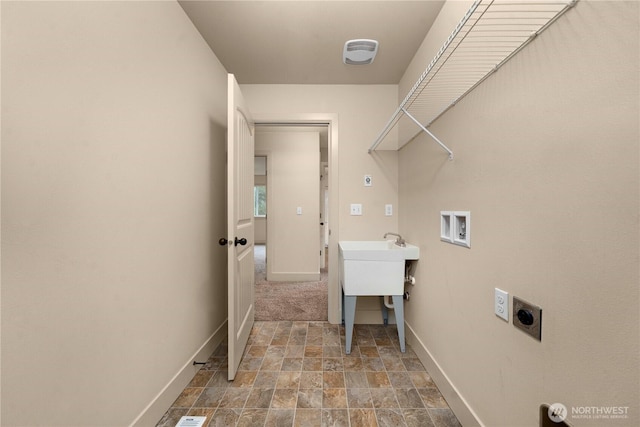 clothes washing area with hookup for a washing machine, visible vents, laundry area, electric dryer hookup, and stone finish floor