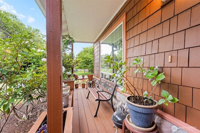 balcony featuring a porch