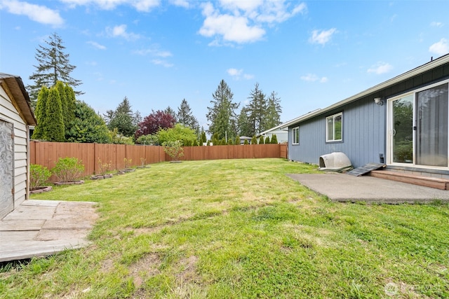view of yard featuring a fenced backyard and a patio