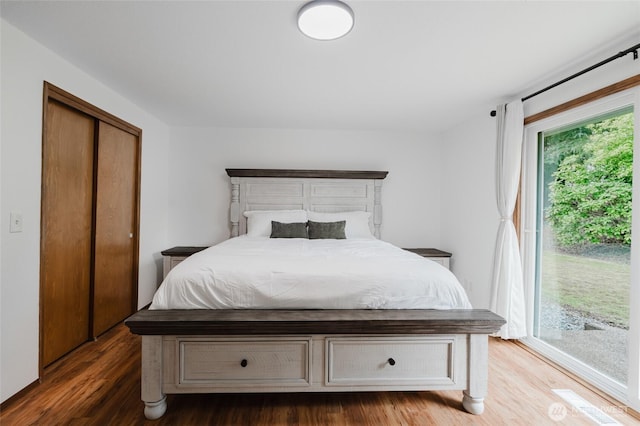 bedroom with wood finished floors