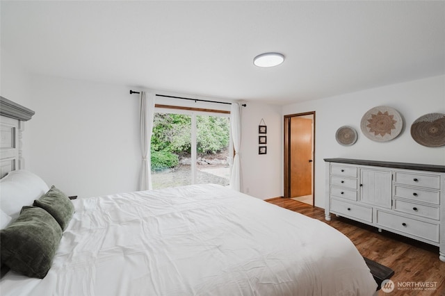 bedroom featuring access to exterior and dark wood-style floors