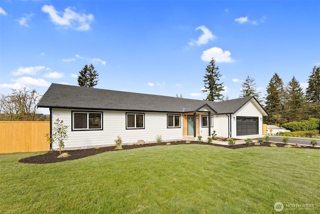 single story home with a front lawn, concrete driveway, an attached garage, and fence