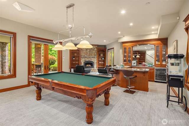 18212 244th Ave NE, Woodinville, WA 98077 - playroom featuring beverage cooler, pool table, bar, baseboards, and a stone fireplace