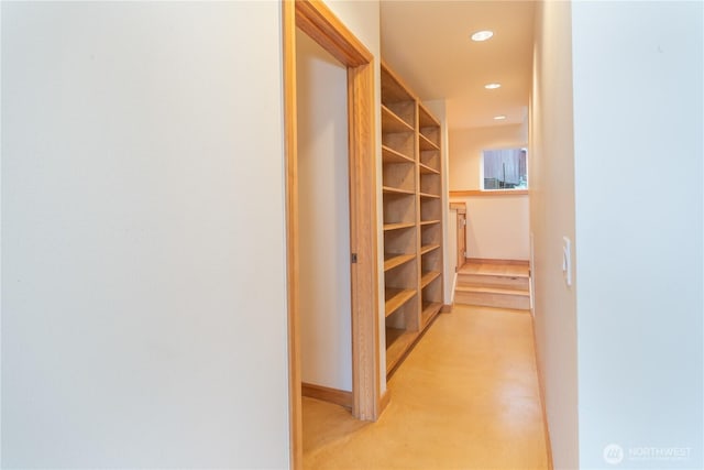 hallway with recessed lighting