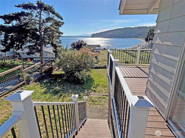 balcony featuring a water view