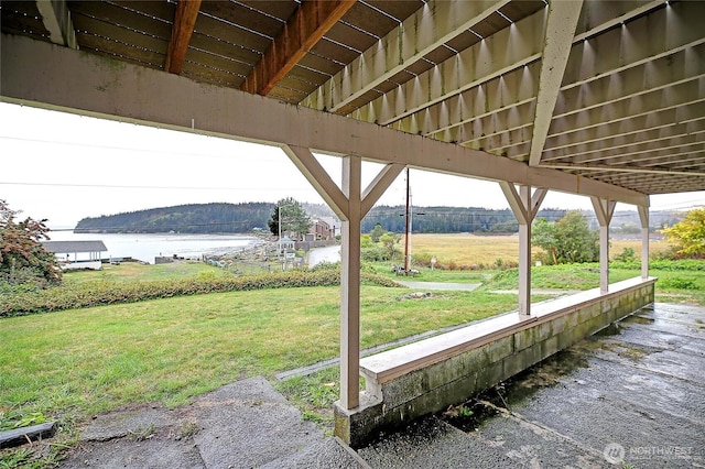 view of patio / terrace with a water view