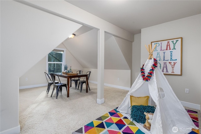 game room featuring vaulted ceiling, carpet flooring, and baseboards