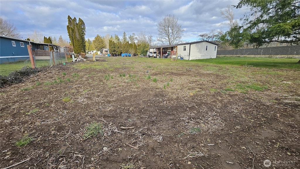 view of yard featuring fence