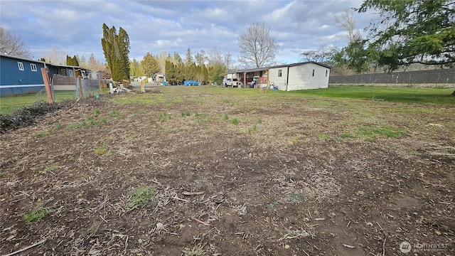 view of yard featuring fence