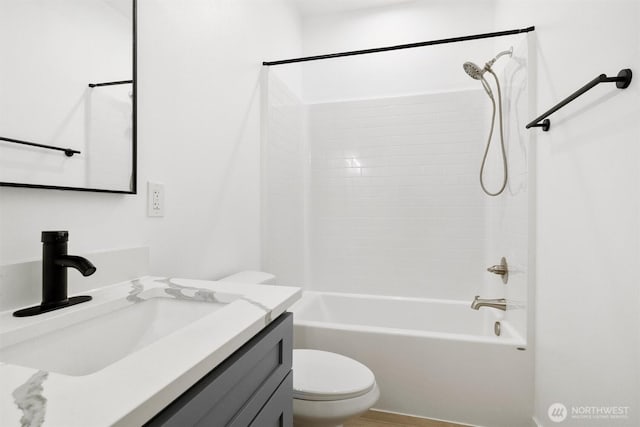 full bathroom with vanity, toilet, and shower / bathtub combination