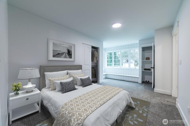 bedroom featuring baseboards and carpet floors