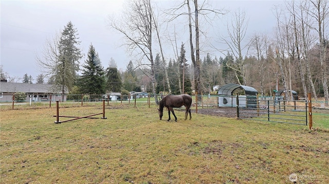 view of yard with a gate and fence