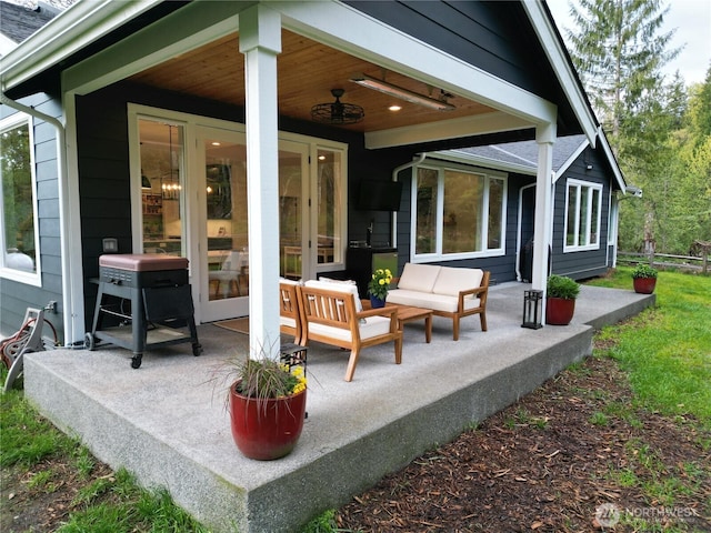 view of patio / terrace featuring area for grilling, an outdoor hangout area, and french doors