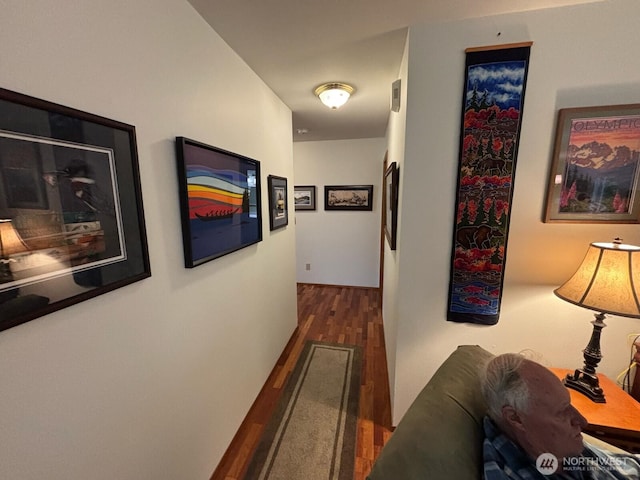 hallway with dark wood-style floors