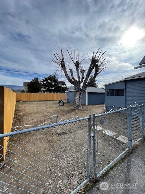 view of yard featuring fence