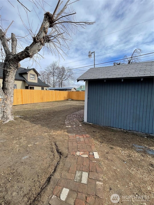 view of yard featuring fence